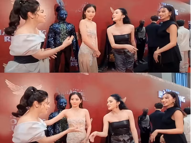 Cách đây không lâu, Hương Giang cũng vướng ồn ào. Khi tham gia sự kiện, cô bất ngờ kéo tay Hoa hậu Thùy Tiên để lên chụp ảnh cùng, “vượt mặt” Nhật Kim Anh và Lệ Nam. Hành động của Hương Giang bị chỉ trích kém duyên dù Nhật Kim Anh và Lệ Nam đồng ý cho Thùy Tiên chen hàng. Ảnh: Người đưa tin