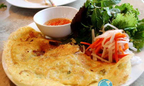 Vị ngọt, giòn của thịt ốc hòa lẫn vị béo, thơm của bột gạo tạo thành một món ăn dân dã thật sự hấp dẫn trong ngày Tết Đoan Ngọ nơi đây. Ảnh: dulichbentre