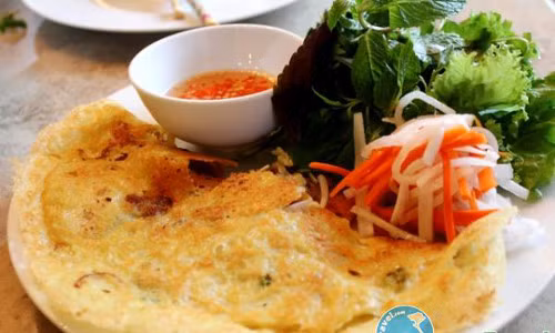 Vị ngọt, giòn của thịt ốc hòa lẫn vị béo, thơm của bột gạo tạo thành một món ăn dân dã thật sự hấp dẫn trong ngày Tết Đoan Ngọ nơi đây. Ảnh: dulichbentre