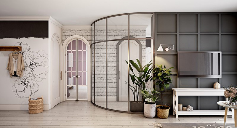 Cây xanh tạo bước đệm linh hoạt dễ dàng chuyển đổi từ tường bê tông sang tường kính. Vách kính thiết kế cong, tăng sự mềm mại và uyển chuyển trong cấu trúc nhà ở.