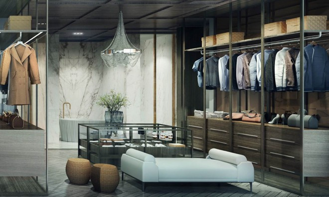 Phòng thay đồ rộng lớn với tủ quần áo tinh tế cũng được trang bị một khu vực riêng cho việc thư giãn.