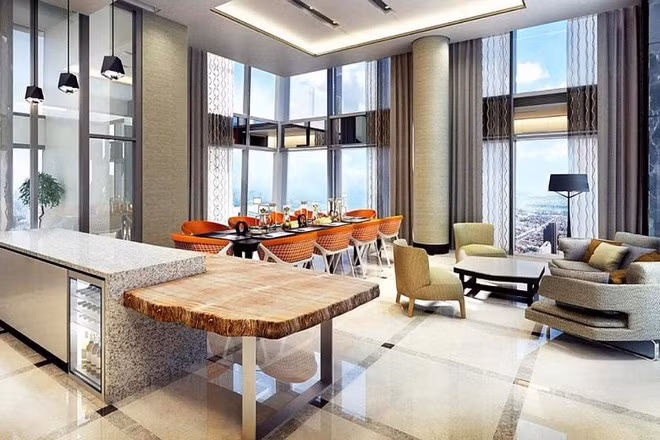 Một không gian khác phục vụ việc chiêu đãi người thân bạn bè được tích hợp với quầy bar thu nhỏ. Căn phòng này được trang trí với những nội thất mang màu sắc tươi sáng.