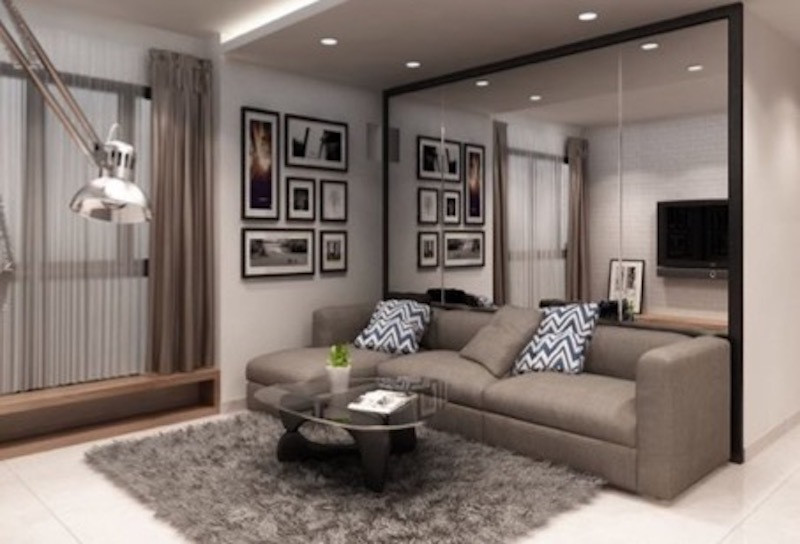 Đặt gương trong phòng khách được cách điệu để mang tính thẩm mĩ cao hơn.