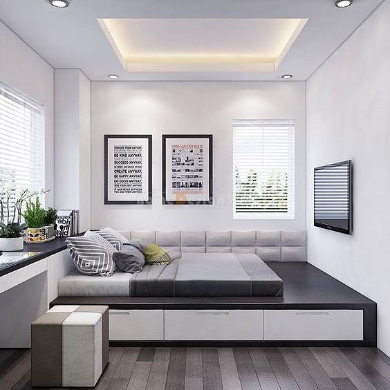 Các tone màu trầm cùng thiết kế tối giản mang đến cho không gian sự thoáng đãng.