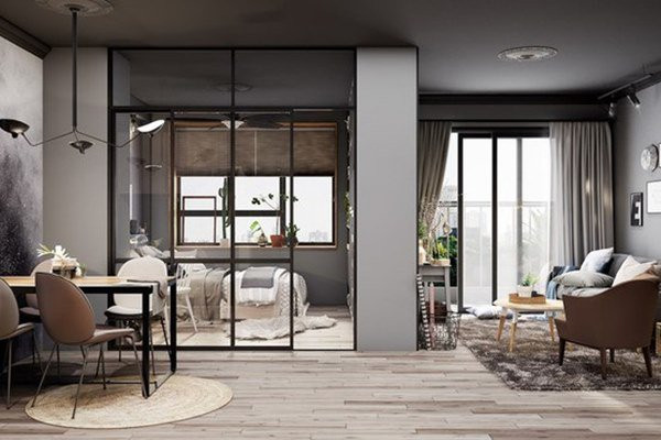 Bàn ăn đồng thời cũng là bàn làm việc, đặt ngay ngắn ngăn giữa phòng khách với phòng ngủ.