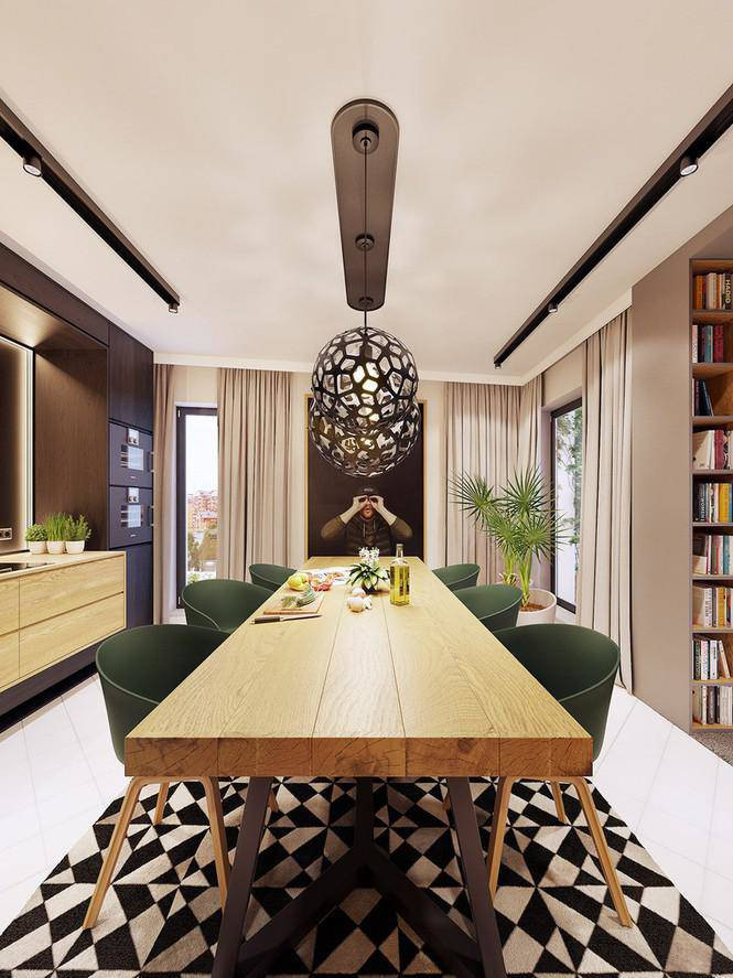 Thảm màu đen, trắng đánh dấu khu vực bàn ăn so với lối đi và tủ bếp.