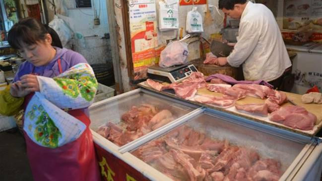 Trung Quoc muon ngung nhap khau thit lon Canada