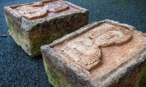 Phat hien 2 tang da vut chong cho ngoai vuon la bau vat vo gia