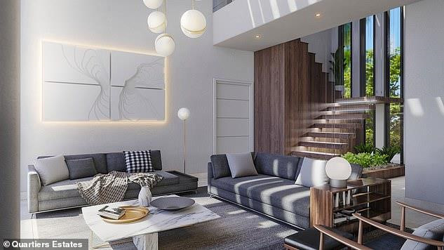 Phòng khách được thiết kế với không gian mở cùng chiếc cầu thang gỗ độc đáo dẫn đến những không gian sống khác trong căn biệt thự.