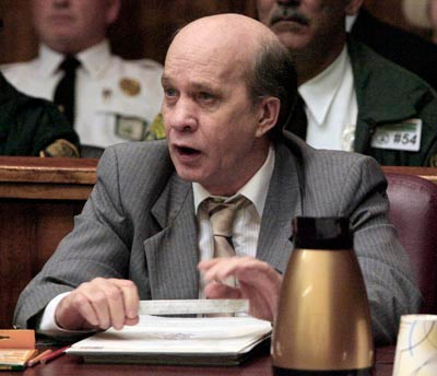 Nghi phạm John Evander Couey.