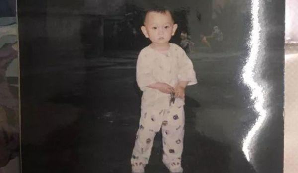 Bi kich nuoi hon 20 nam moi biet khong phai con trai ruot