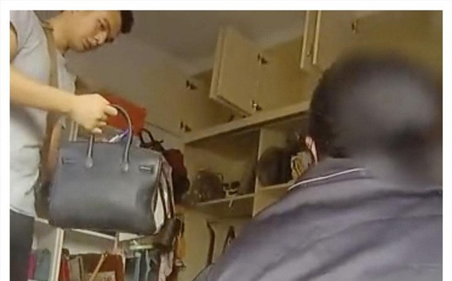 Me gia mang tui 'Louis Vuitton' di cho mua thit lon, con gai bi bat giam