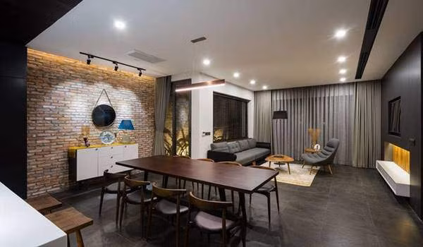 Bếp ăn liền kề phòng khách và sử dụng đồ gỗ nội thất chủ đạo.