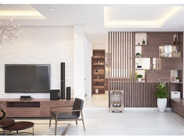2. Thiết kế vách ngăn phòng khách bằng gỗ tự nhiên Nếu định hướng theo đuổi phong cách cổ điển, sang trọng cho ngôi nhà của mình, bạn chắc chắn không nên bỏ lỡ mẫu tủ vách ngăn phòng khách và bếp được thiết kế từ chất liệu gỗ tự nhiên như xoan đào, gỗ sồi,… Loại vách ngăn này sẽ đảm bảo tính chắc chắn, bền vững theo thời gian, mang lại cho người dùng cảm giác an tâm hơn về chất lượng.