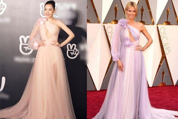 Bộ cánh của Chi Pu trông như “chị em sinh đôi” với chiếc váy mà siêu mẫu Heidi Klum đã diện trên thảm đỏ Oscar 2016. Cấu trúc, phom dáng hay chất liệu trong thiết kế chiếc váy đều tương đồng với mẫu váy của hãng Marchesa.