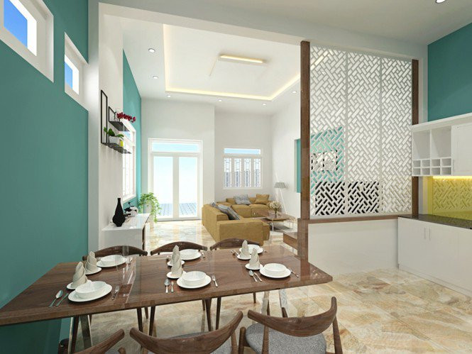 Ngôi nhà sử dụng tông màu trắng xanh khiến không gian luôn tươi mát.