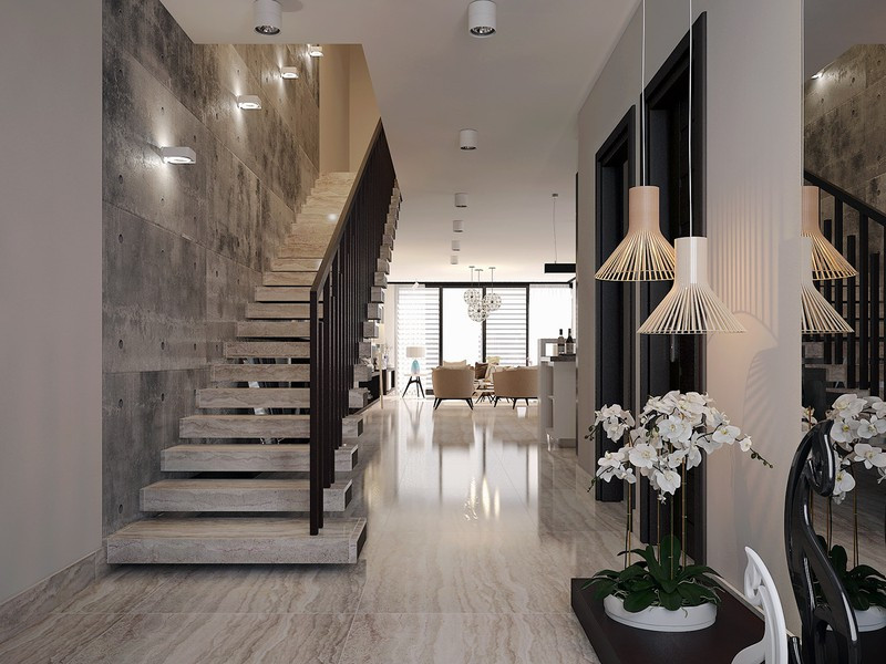 Cầu thang làm bằng đá tự nhiên dẫn lối lên các tầng bên trên của nhà phố.