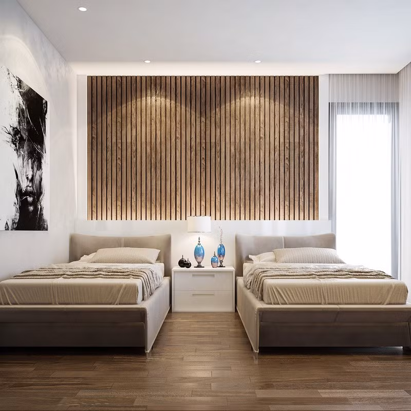 Cũng là cách trang trí tường đầu giường như vậy nhưng phòng ngủ thứ 3 có diện tích rộng hơn và đặt 2 chiếc giường ngủ dành cho hai cậu bé, con của chủ nhà.