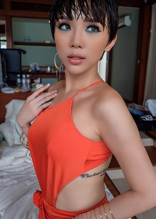 Tóc Tiên cắt tóc ngắn cá tính, có những hình xăm táo bạo. Ảnh: FBNV