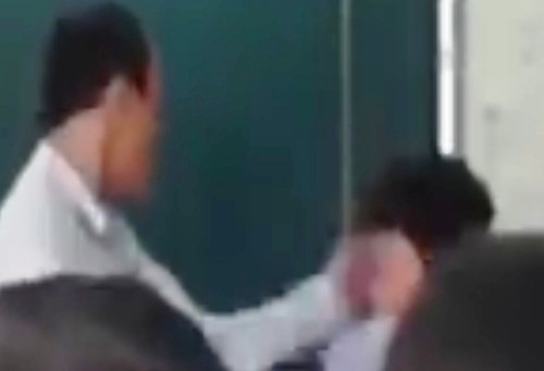 Hiệu trưởng trường THCS Nguyễn Hiền xác nhận người đánh nam sinh trên bục giảng là giám thị Đặng Thế Anh.