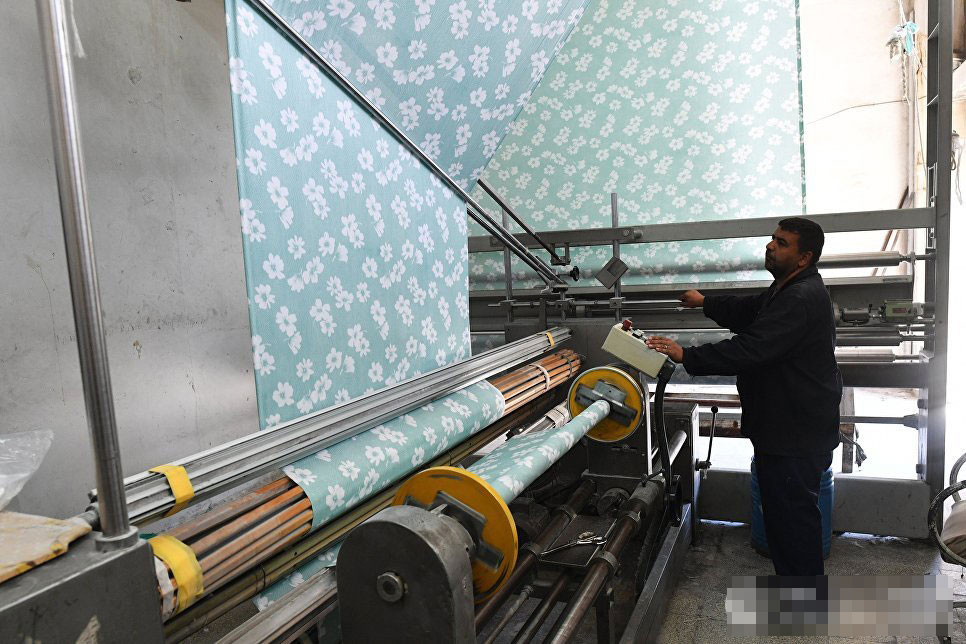 Nhà máy vải ở Syria giữa thời chiến sự.