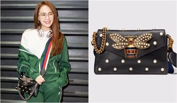 Minh Hằng lại yêu thích kiểu túi gắn họa tiết ong đính đá của Gucci. Thiết kế đặc biệt này trị giá 3.805 USD ( khoảng 86 triệu VND).