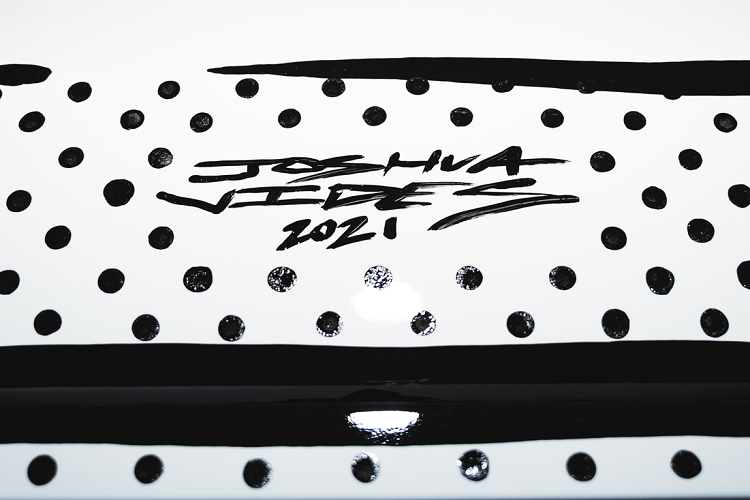 Joshua Vides lớn lên ở một vùng ngoại ô thiếu thốn của Los Angeles, nơi anh hiếm khi có cơ hội được nhìn tận mắt những chiếc BMW hoặc BMW M. Sau nhiều năm phát triển của sự nghiệp, Joshua Vides từng làm qua nhiều công việc như làm nhân viên pha chế, lính cứu hỏa, thợ tráng men, tài xế giao hàng và sau đó là nhà thiết kế đồ họa cho một loạt nhãn thời trang.