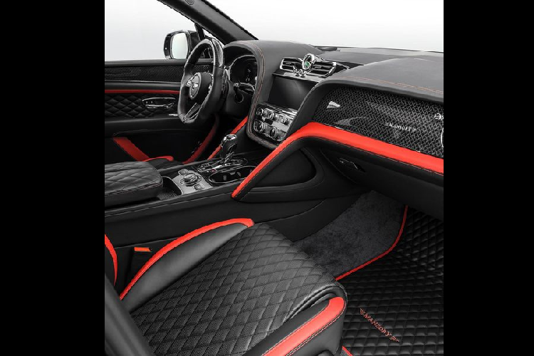 Chủ xe có thể nâng cấp la-zăng lên loại 23 hoặc 24 inch với các điểm nhấn màu đỏ nổi bật trên nền thân đen của chiếc SUV.