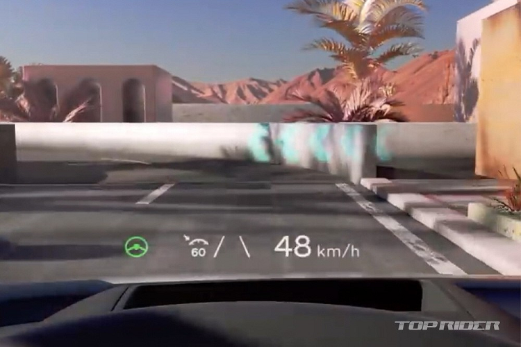 Bước vào bên trong Hyundai Ioniq 5, người dùng sẽ được chào đón bằng không gian nội thất rộng rãi và hiện đại với 2 màn hình 12 inch nối liền nhau trên mặt táp-lô, cần số nằm sau vô lăng cũng như màn hình hiển thị thông tin kính lái, hỗ trợ công nghệ thực tế ảo. Thêm vào đó là cụm điều khiển trung tâm của hàng ghế trước có thể trượt lên/xuống trong khoảng cách 140 mm. Tương tự như vậy, mọi ghế bên trong Hyundai Ioniq 5 đều có thể trượt lên/xuống tiện dụng.