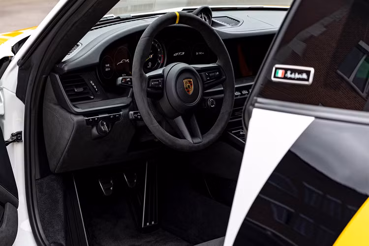 Dự án cá nhân hóa chiếc xe này mất tổng cộng khoảng 3 năm. Ban đầu, Porsche hoàn thành bản phác thảo trên phiên bản GT3 991.2 nhưng sau khi 911 GT3 mới ra mắt, Paolo đã quyết định đổi sang nguyên mẫu 911 GT3 992. Grant Larson, một nhà thiết kế lâu năm của Porsche nói rằng thách thức lớn nhất chính là quá trình chuyển đổi các đường nét đồ họa trên một chiếc xe góc cạnh như 956 sang những đường nét cong mềm hoàn hảo của 911 GT3 mới.