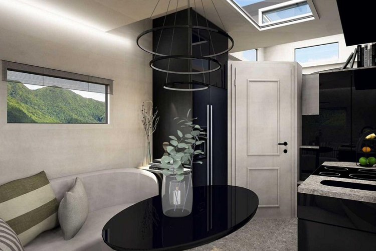 Bạn có thể tìm thấy một phòng tắm tiện nghi ở phía sau cánh cửa góc cạnh ở phía trước không gian sống, và nó cũng lạ mắt như mọi thứ khác. Một nhà vệ sinh hình kim tự tháp kỳ lạ nhất định sẽ thu hút ánh nhìn của bạn, và nó được đặt bên cạnh một bồn rửa nhỏ với gương trang điểm lớn trên tường và một vòi hoa sen phía trên đầu.