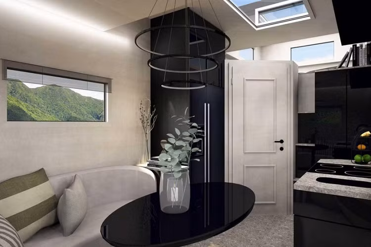 Bạn có thể tìm thấy một phòng tắm tiện nghi ở phía sau cánh cửa góc cạnh ở phía trước không gian sống, và nó cũng lạ mắt như mọi thứ khác. Một nhà vệ sinh hình kim tự tháp kỳ lạ nhất định sẽ thu hút ánh nhìn của bạn, và nó được đặt bên cạnh một bồn rửa nhỏ với gương trang điểm lớn trên tường và một vòi hoa sen phía trên đầu.