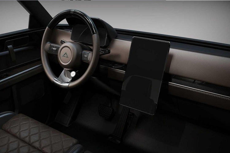 Với thân vỏ được hoàn thiện trong màu xanh SF Blue được truyền cảm hứng bởi bầu trời ở San Francisco, bán tải điện Wolf có bố cục cabin đơn, phần đầu vuông vức tích hợp đèn pha LED tròn giống như người anh em Jax. Bên canh đó, các chi tiết như vòm bánh xe rộng, khung cản va lớn phía trước, đèn trên nóc, và một khung chống lật cũng gmang lại cho chiếc bán tải điện này một dáng vẻ cứng cáp, trong tấm bảo vệ dưới gầm giúp nó sẵn sàng đi off-road.