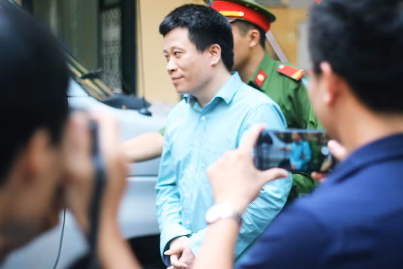 Nét mặt tươi tỉnh của bị cáo Hà Văn Thắm.