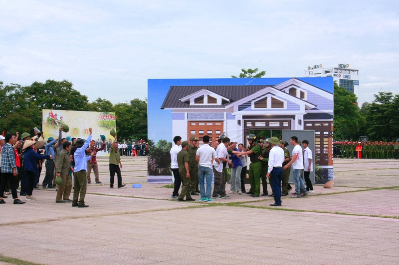 Hai Duong ra mat luc luong tham gia bao ve an ninh, trat tu o co so-Hinh-9