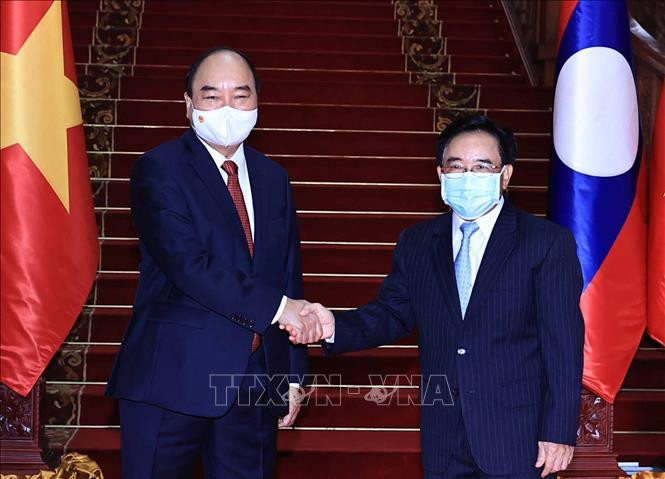 Chu tich nuoc Nguyen Xuan Phuc hoi kien Thu tuong Lao