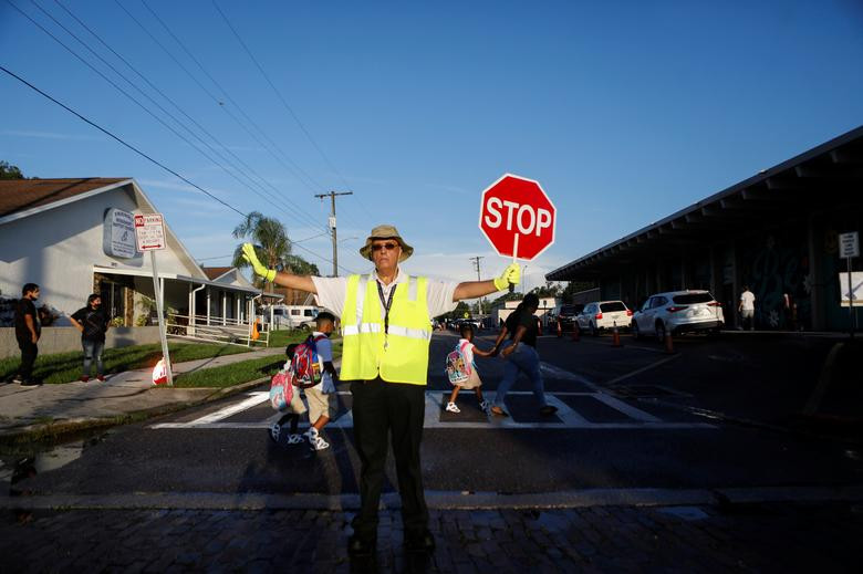 Anh: Hoc sinh khap nuoc My tro lai truong bat chap COVID-19
