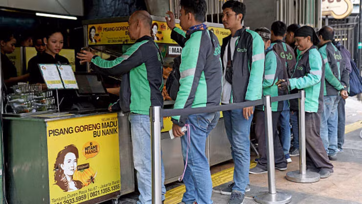 Grab hay Gojek se chien thang trong cuoc dua 