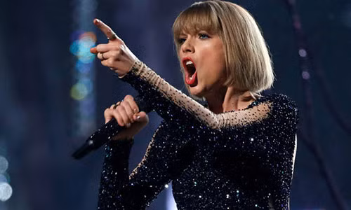 Taylor Swift thang kien vu bi sam so, duoc den bu 1 USD