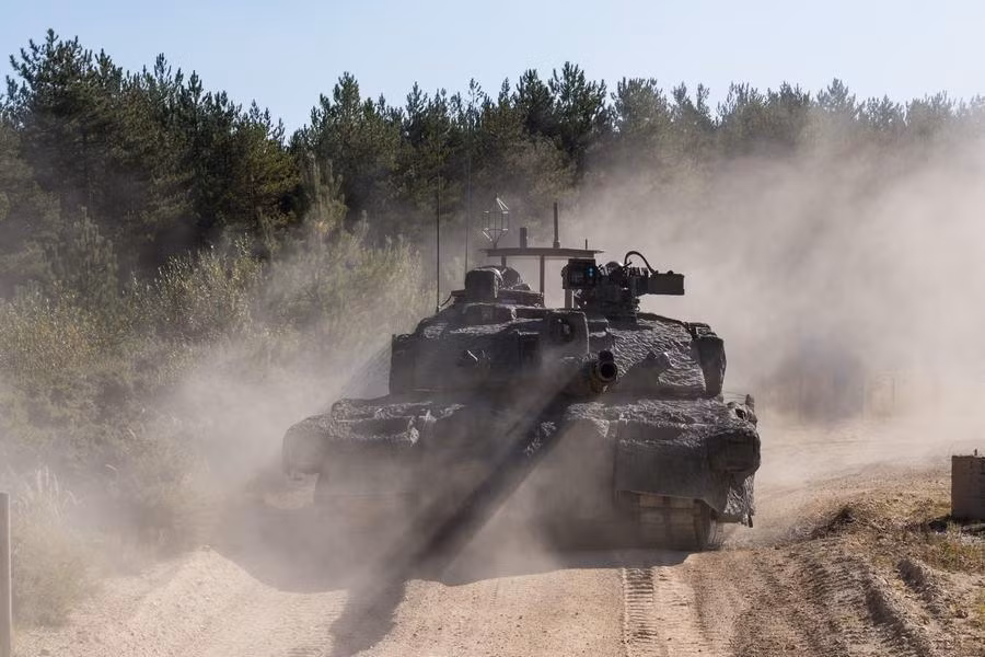 Challenger 2 trở nên vô cùng hầm hố với “tấm chăn”. Nguồn ảnh: QQ