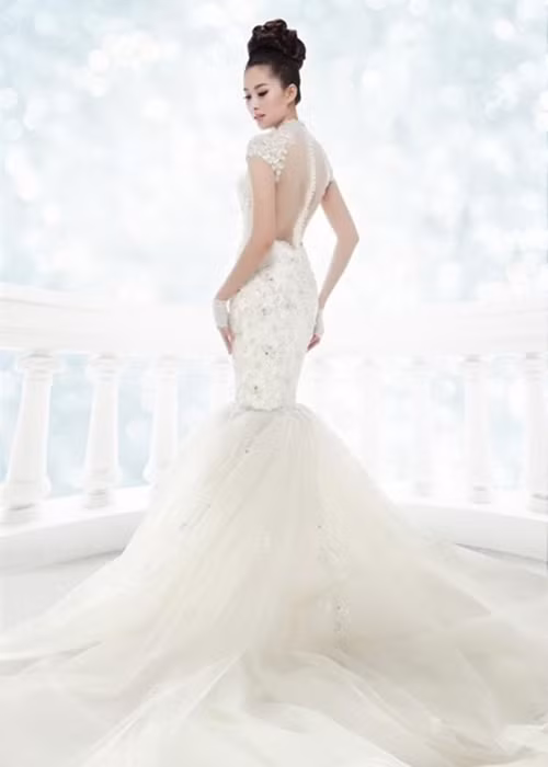 Trước đám cưới với bạn trai thành đạt, giàu có, người đẹp gốc Bạc Liêu không ít lần hóa cô dâu. Ảnh: Netlife