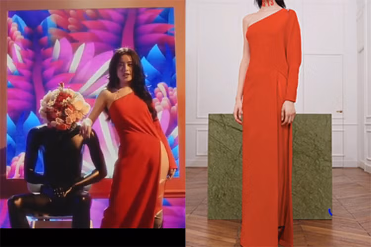 Bộ đầm lệch vai tông đỏ có giá 54 triệu đồng cũng được cựu hot girl chọn. Sản phẩm đến từ thương hiệu nổi tiếng Givenchy. Ảnh: chụp màn hình