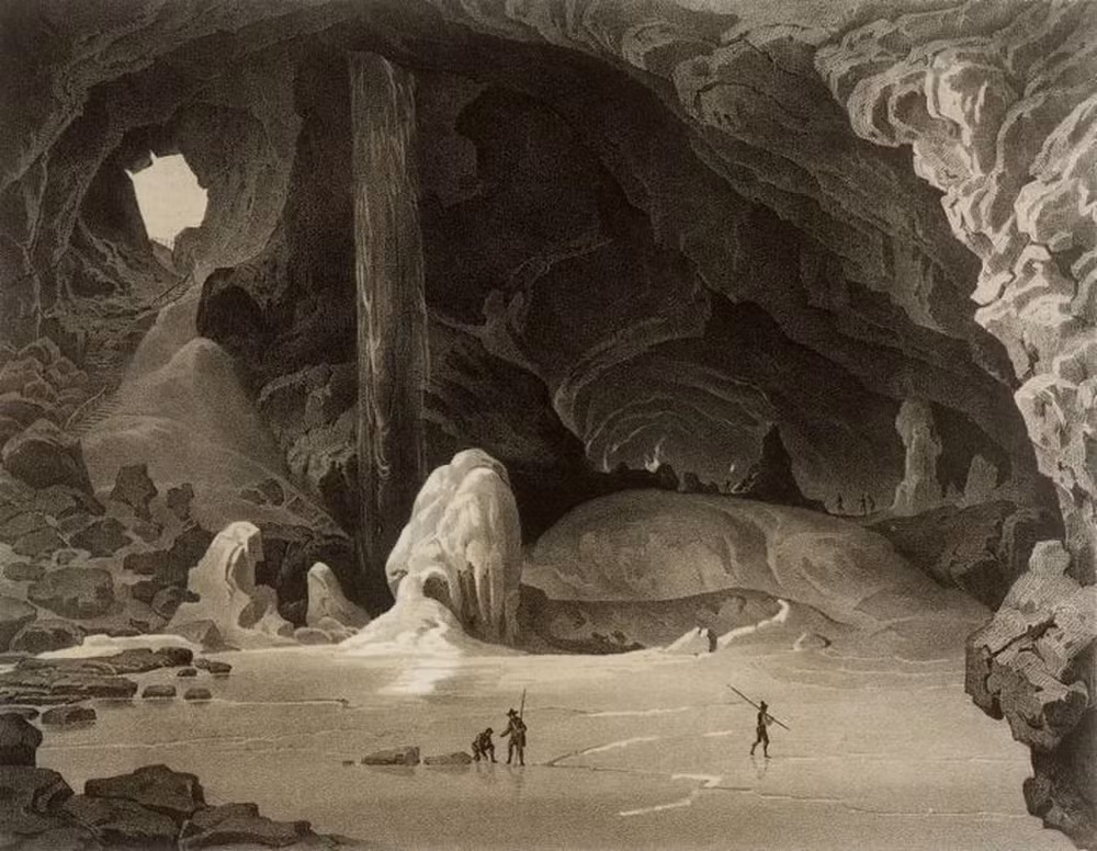 Một bản in thạch bản năm 1845 cho thấy những người đang khám phá hang Kolowratshöhle vài năm sau khi phát hiện ra nó gần biên giới Đức, phía tây Salzburg (Áo). Ảnh: National Geographic