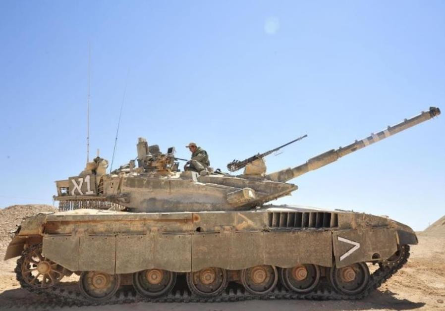 Điểm nhất quan trọng nhất của xe tăng chủ lực Merkava đó là nó có cả một khoang chứa lính ở phía sau - giúp chở theo được tối đa 6 lính với đầy đủ trang bị vũ khí. Nguồn ảnh: Tanker.