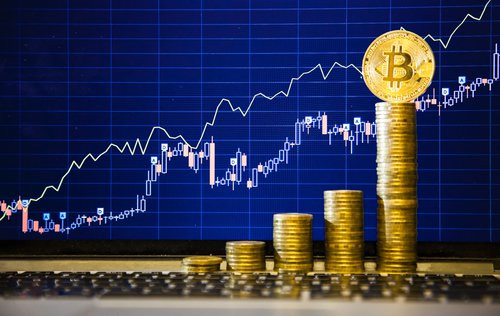Những màn tăng nóng kỷ lục của Bitcoin khiến giới đầu tư chao đảo. Với một số chuyên gia kinh tế, nhiều dấu hiệu chứng tỏ Bitcoin là bong bóng. Ảnh: CNN.