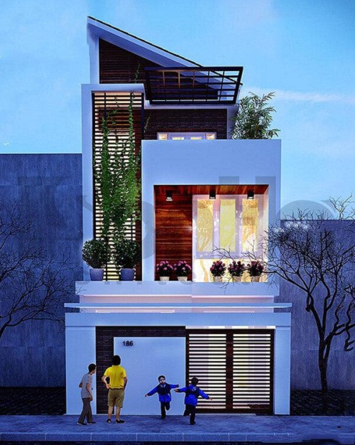 Thiết kế nhà ống 2 tầng kiểu dáng biệt thự với phần mái lệch bắt mắt, phù hợp với cuộc hiện đại, cho gia đình thu nhập có thu nhập cao. Ảnh: 10nhadep.