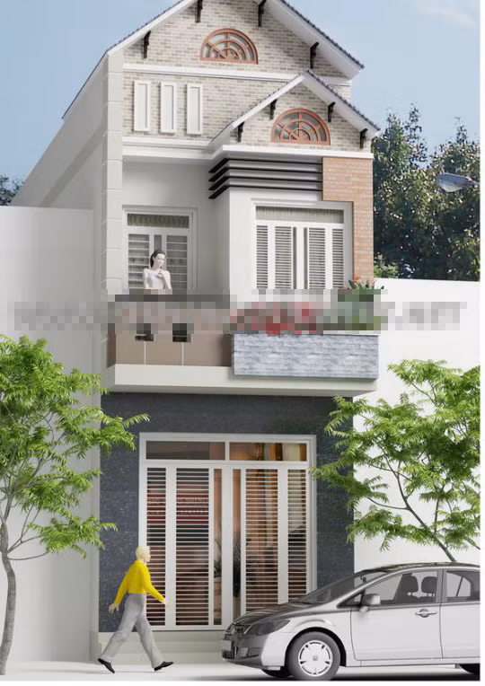 Trước mặt ngôi nhà phố 2 tầng có trồng cây xanh để không gian sống trong lành và sinh động hơn. Ảnh: Kientrucnhaviet.