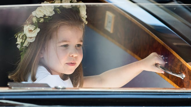 Gương mặt bầu bĩnh xinh xắn của Charlotte hồi tháng 5/2018. Ảnh: Pool.