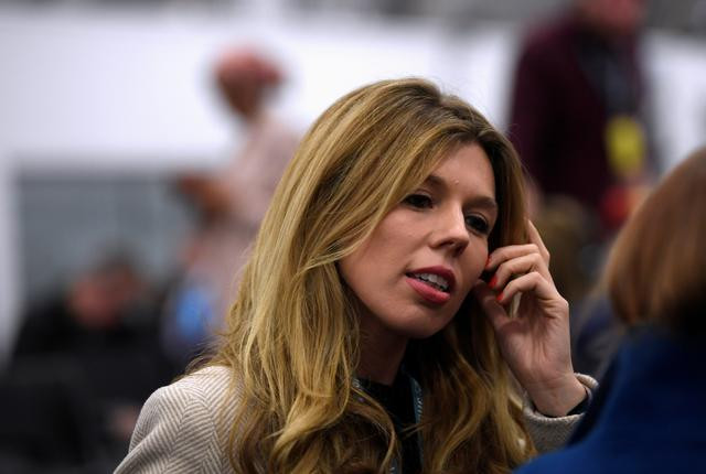 Carrie Symonds sinh ngày 17/3/1988, là con gái của ông Matthew Symonds, người đồng sáng lập tờ báo The Independent, và bà Josephine McAffee - một luật sư của tờ báo này. Bà Carrie Symonds được mô tả là người phụ nữ tài giỏi, xinh đẹp và quyến rũ. Ảnh: Reuters.