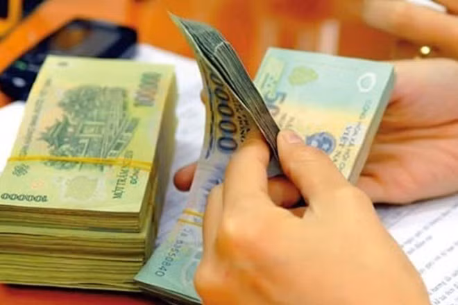 Từ ngày 1/1 tới, lương tối thiểu vùng sẽ tăng từ 2.580.000 đến 3.750.000 đồng/tháng. Ảnh: Việt Dũng.